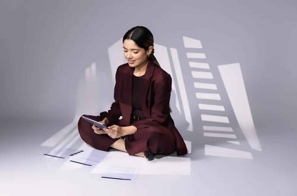 Barkha Agarwal seated among light and shadow